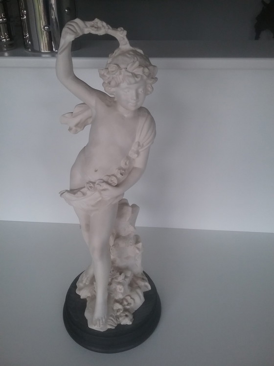 Image 1 of Jongen met bloemen 