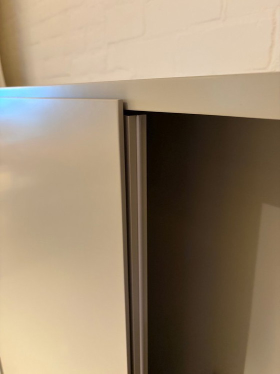 Image 1 of Interlübke Studimo TV wandkast met schuifdeuren