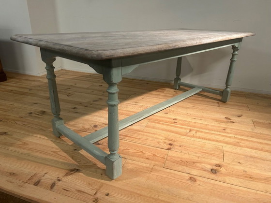 Image 1 of Landelijke vintage boerentafel met groen onderstel in eik