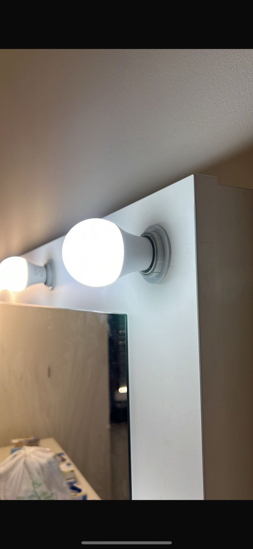 Custom-made dressing table with illuminated mirror