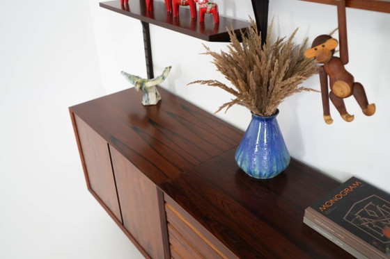 Modulaire stellingen van palissanderfineer van Poul Cadovius, Denemarken, jaren 70. – Wandkast, Mdf (photo 21 of 27)