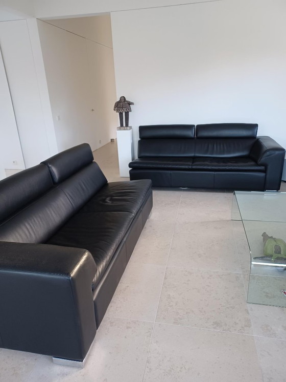 Image 1 of Leolux sofa set, model Howlazy, in black aniline leather and polished aluminum legs.