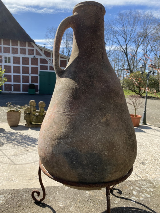 Image 1 of Vintage Berber barrel with authentic iron stand, 74 cm