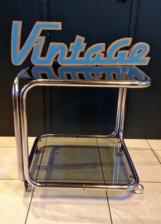 Vintage rolling table in chrome and smoked glass
