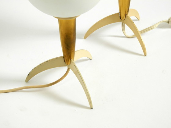 Image 1 of Two Mid-Century Modern rocket table lamps in brass and glass