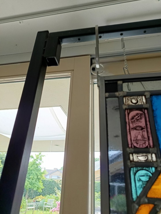 Image 1 of Vetro colorato in espositore appeso.