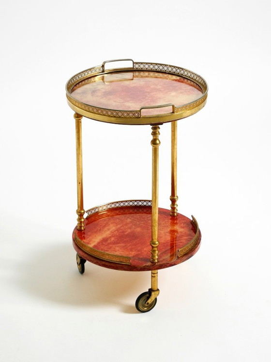 Image 1 of Round, small 1960s Aldo Tura serving or bar trolley in red goatskin leather | Made in Italy