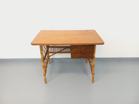 Image 1 of Vintage Louis Sognot bureau in rotan en hout uit de jaren 60