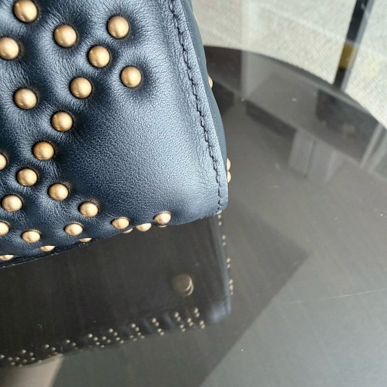 Image 1 of DIOR LADY SMALL FLAP - PELLE DI VITELLO CANNAGE CON BORCHIE NERE E MATERIALI ORO