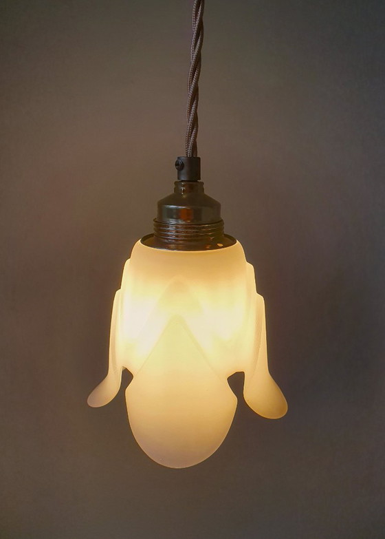 Image 1 of White glass Art Deco lampshade. White frosted glass with a beautiful floral design.