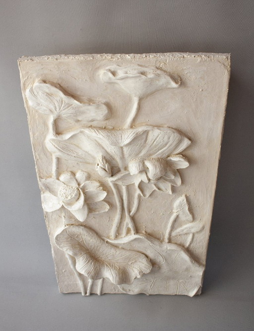 Bas-relief with flowers. Relief with flowers. Flowers in relief. Flower sculpture. Sculpted flowers. Flower painting. Ornament