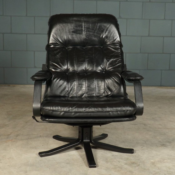 Image 1 of Vintage Unico draaifauteuil met hocker – jaren 70