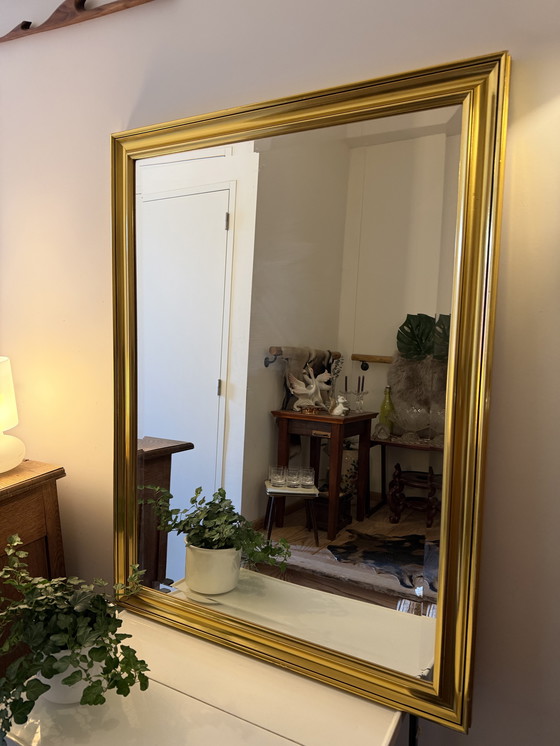 Image 1 of Large facet-cut mirror in a gold-colored frame