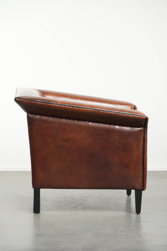 Image 1 of Sheepskin Art Deco design armchair with black piping