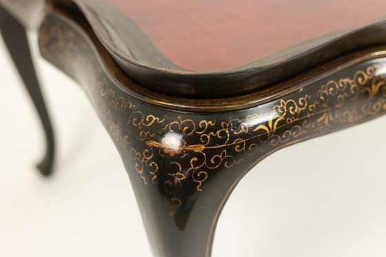 Image 1 of Coffee table with removable top in red and black lacquered wood. 1950s.