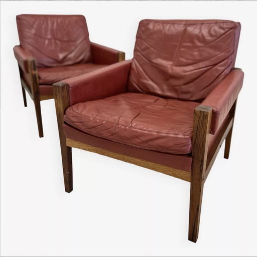 Vintage Deense loungestoelen in rozenhout en leer. 1960s.
