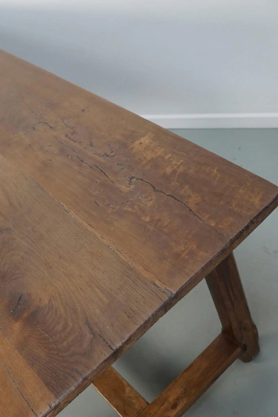 Image 1 of Early 20th-century French rustic country dining table made of oak and elm