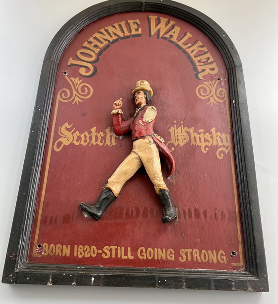 Image 1 of JOHNNIE WALKER – Original vintage wooden plaque with 3D relief figure “The Striding Man” (ca. 1970s)