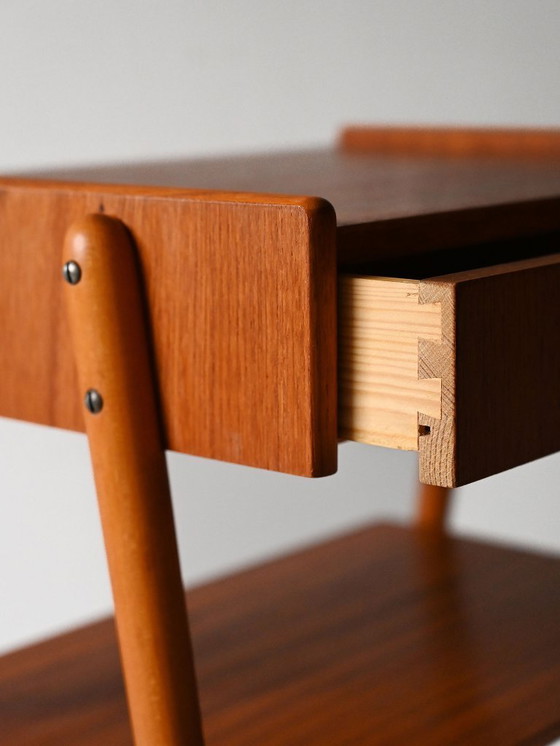 Image 1 of Paar vintage Scandinavische teakhouten nachtkastjes met verborgen lade