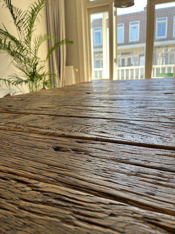 Image 1 of solid robust oak table
