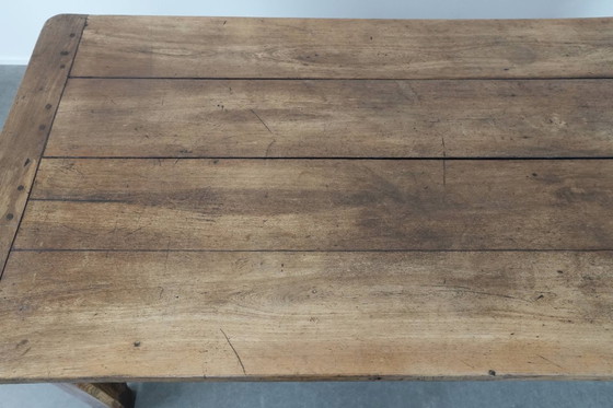 Image 1 of Robust antique French 6-person dining table made of fruit wood with 3 drawers from the late 18th century