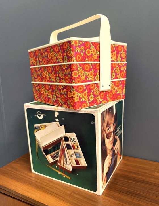 Image 1 of 1970s plastic sewing box with flowerprint in original box