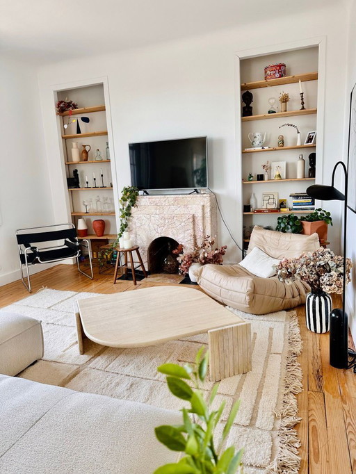 Roche Bobois “Eye” travertine coffee table