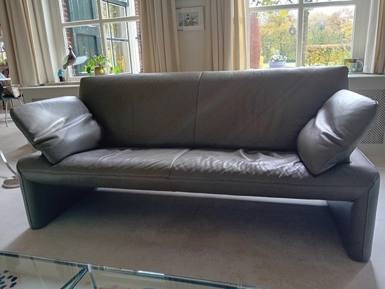 Image 1 of Two Jori 3-seater Linea leather sofas, Taupe, 210 cm wide. Armrests adjustable in 4 positions. Asking price €600 each.