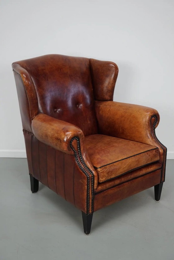 Image 1 of Vintage Nederlandse clubfauteuil in cognackleurig leer