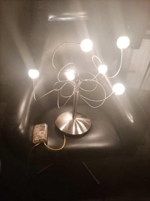 Modern design table lamp in brushed chrome metal with 6 lights and dimmer