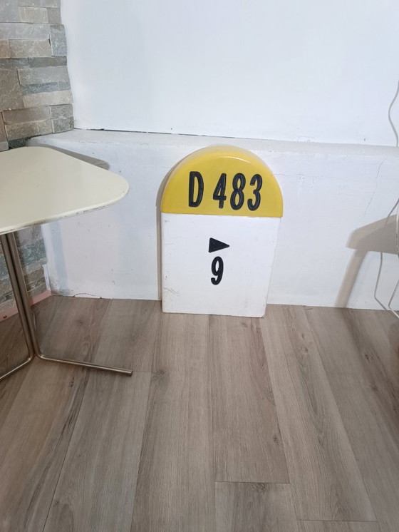 Image 1 of Kilometer marker on a French road, 1990s