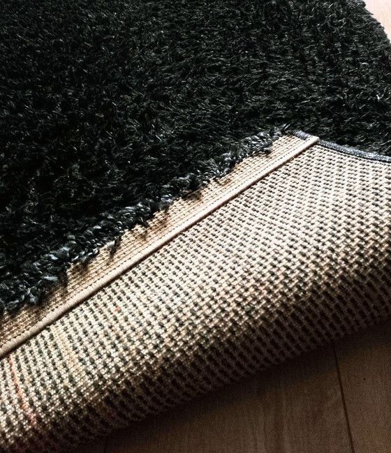 Image 1 of moquette noire à poils longs