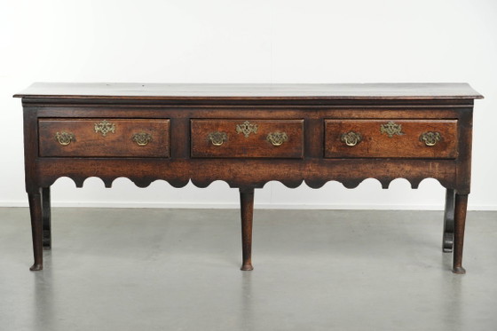 Image 1 of Large English antique oak sideboard/dresser with 3 working drawers from the early 18th century with a beautiful patina
