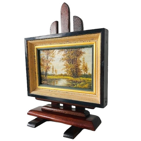 Image 1 of Vintage forest landscape oil painting on stand signed 1960s