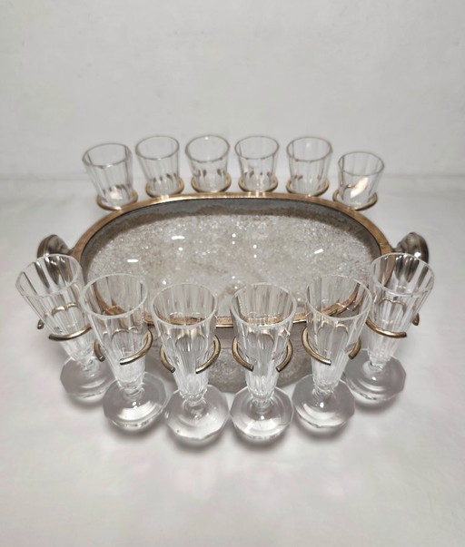 Secchiello per il ghiaccio in vetro con dodici bicchieri. Spagna, anni '40.