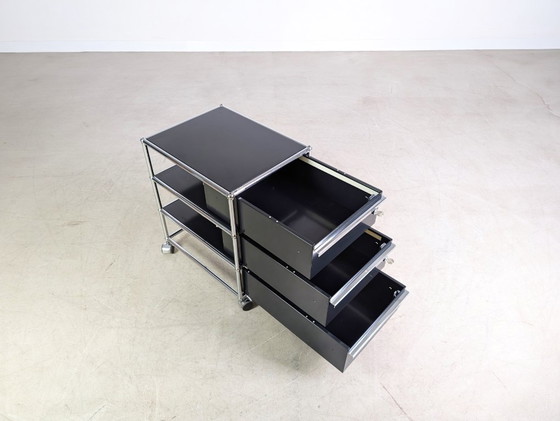 Image 1 of 6 ruote per mobile da ufficio USM Haller con serratura blu scuro