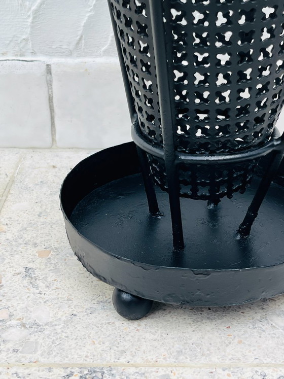 Image 1 of Vintage umbrella stand in black perforated metal and brass
