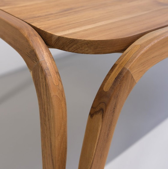 Image 1 of Handmade dining table made of solid teak with a natural finish