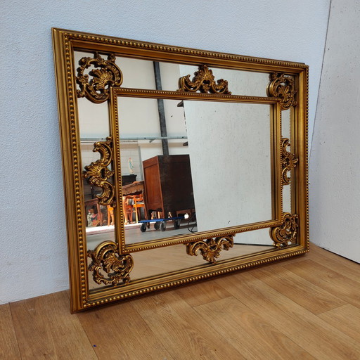 Miroir de cheminée baroque rococo doré vintage.