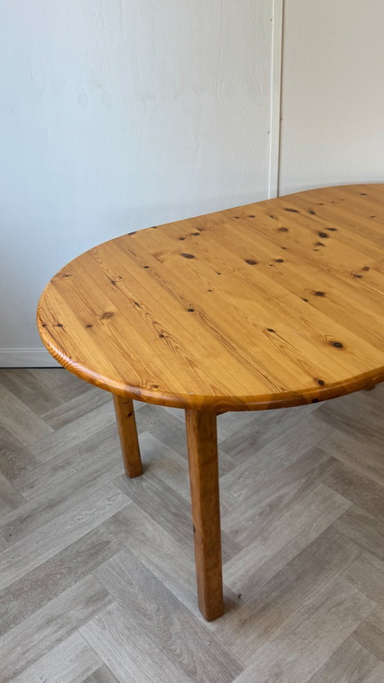Image 1 of Oval pine extendable table.