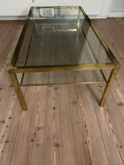 Hollywood Regency style coffee table in glass and gold