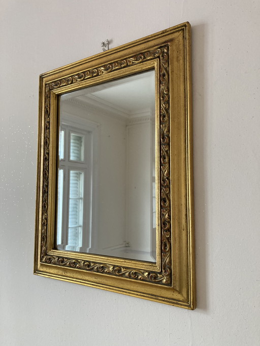 Bevelled mirror 53x43cm