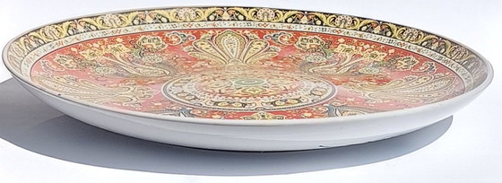 Image 1 of Large Chinese decorative plate with traditional Middle Eastern and Islamic patterns.