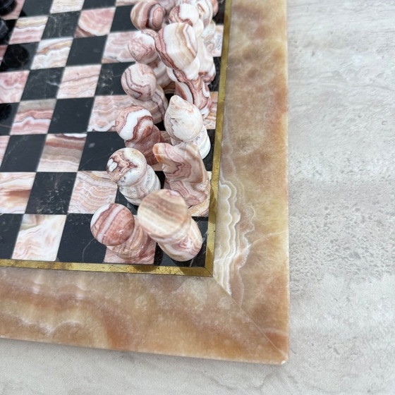 Image 1 of Scacchiera in marmo anni '70 rosa con bordo nero e rame