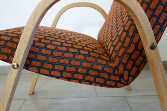 Image 1 of Een paar Bow Wood fauteuils van Steiner, jaren 1950.