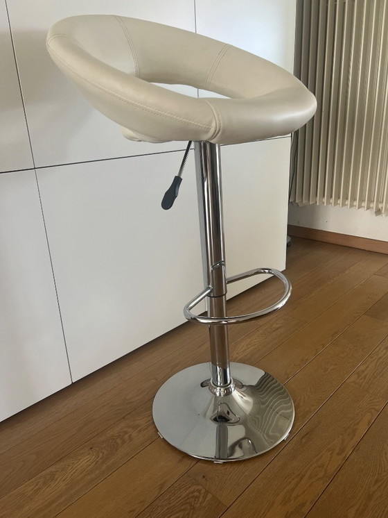 Image 1 of 4 bar stools adjustable in height