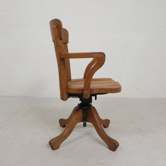 Silla de oficina de roble con sistema de muelles ajustable y regulación de altura, década de 1950. (photo 13 of 35)