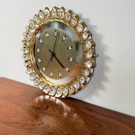 Image 1 of Hollywood regency clock from Junghans, gold and crystal