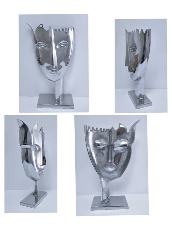 Image 1 of sculpture visage stylisé métal poli