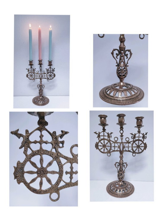 Image 1 of Kandelaar met pauwenmotief en wielen, massief messing